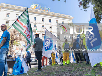 Railway workers protest against salary reductions and benefits cuts in Rome, Italy, on September 20, 2024. (