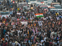 Various citizen organizations take out a torch rally in Kolkata, India, on September 20, 2024, in protest against the rape and murder of a s...