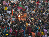 Various citizen organizations take out a torch rally in Kolkata, India, on September 20, 2024, in protest against the rape and murder of a s...