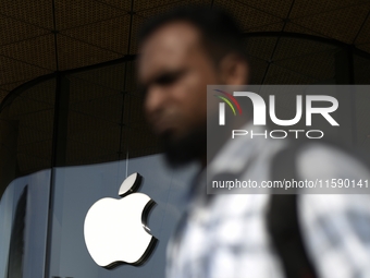 The Apple logo is seen on the launch day of the iPhone 16 series at Apple BKC, in Mumbai, India, on September 20, 2024. The highly awaited i...