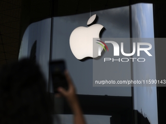 The Apple logo is seen on the launch day of the iPhone 16 series at Apple BKC, in Mumbai, India, on September 20, 2024. The highly awaited i...