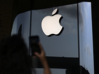 The Apple logo is seen on the launch day of the iPhone 16 series at Apple BKC, in Mumbai, India, on September 20, 2024. The highly awaited i...