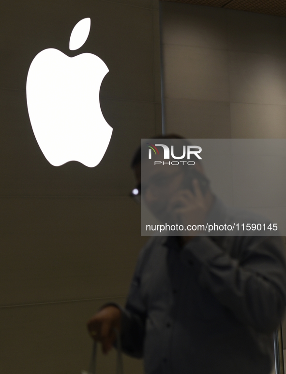 The Apple logo is seen on the launch day of the iPhone 16 series at Apple BKC, in Mumbai, India, on September 20, 2024. The highly awaited i...