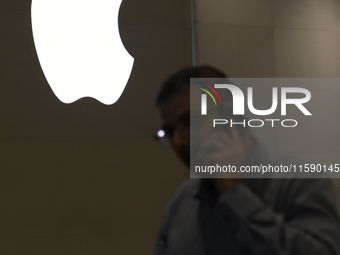 The Apple logo is seen on the launch day of the iPhone 16 series at Apple BKC, in Mumbai, India, on September 20, 2024. The highly awaited i...