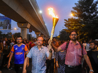 Various citizen organizations take out a torch rally in Kolkata, India, on September 20, 2024, in protest against the rape and murder of a s...