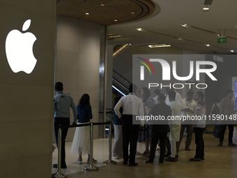 The Apple logo is seen on the launch day of the iPhone 16 series at Apple BKC, in Mumbai, India, on September 20, 2024. The highly awaited i...