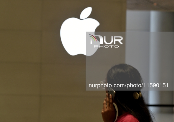 The Apple logo is seen on the launch day of the iPhone 16 series at Apple BKC, in Mumbai, India, on September 20, 2024. The highly awaited i...