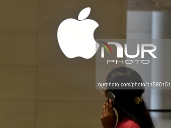 The Apple logo is seen on the launch day of the iPhone 16 series at Apple BKC, in Mumbai, India, on September 20, 2024. The highly awaited i...