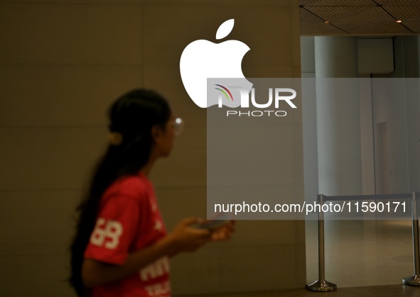 The Apple logo is seen on the launch day of the iPhone 16 series at Apple BKC, in Mumbai, India, on September 20, 2024. The highly awaited i...