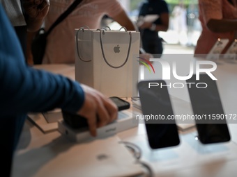 The Apple logo is seen on the launch day of the iPhone 16 series at Apple BKC, in Mumbai, India, on September 20, 2024. The highly awaited i...