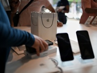 The Apple logo is seen on the launch day of the iPhone 16 series at Apple BKC, in Mumbai, India, on September 20, 2024. The highly awaited i...