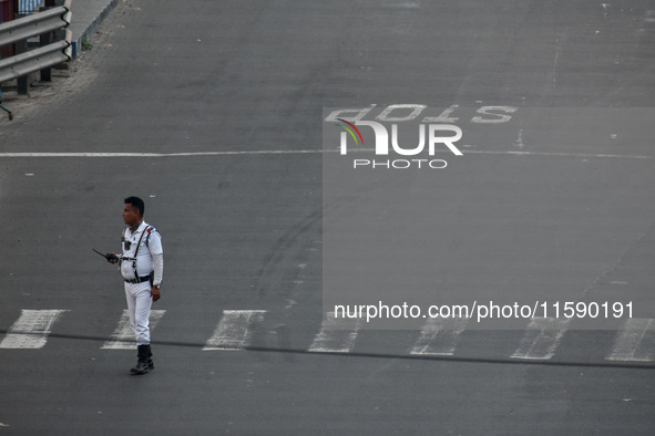 A Kolkata traffic police officer is seen in Kolkata, India, on September 20, 2024. 