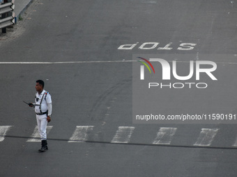 A Kolkata traffic police officer is seen in Kolkata, India, on September 20, 2024. (