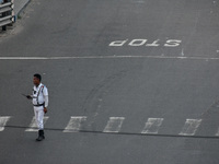 A Kolkata traffic police officer is seen in Kolkata, India, on September 20, 2024. (