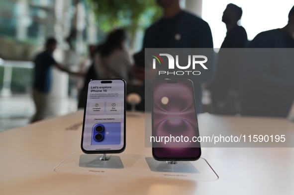 iPhone 16 and iPhone 16 Pro are on display on the launch day of the iPhone 16 series at Apple BKC, in Mumbai, India, on September 20, 2024....