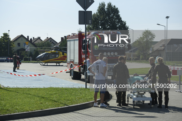 A patient is being transported from the field hospital to a helicopter in Nysa, Poland on September 20, 2024. On September 19, 2024 the mili...