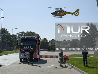 A medical helicopter lands next to the military field hospital in Nysa, Poland on September 20, 2024. On September 19, 2024 the military fie...