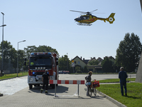 A medical helicopter lands next to the military field hospital in Nysa, Poland on September 20, 2024. On September 19, 2024 the military fie...