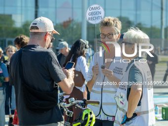 A member of the Omas Gegen Rechts movement participates in the demonstration against global warming in Berlin, Germany, on September 20, 202...