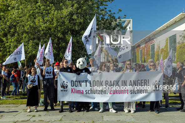 Protesters march during the global climate strike organized by Fridays for Future in Berlin, Germany, on September 20, 2024 