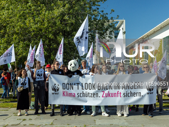 Protesters march during the global climate strike organized by Fridays for Future in Berlin, Germany, on September 20, 2024 (