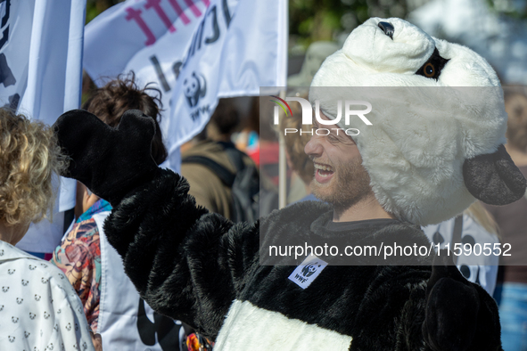 Protesters march during the global climate strike organized by Fridays for Future in Berlin, Germany, on September 20, 2024 