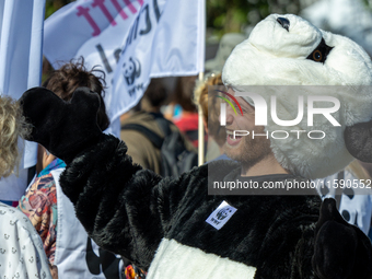 Protesters march during the global climate strike organized by Fridays for Future in Berlin, Germany, on September 20, 2024 (