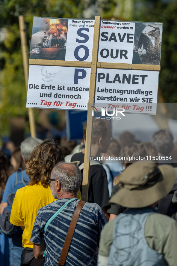 Protesters march during the global climate strike organized by Fridays for Future in Berlin, Germany, on September 20, 2024 