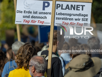 Protesters march during the global climate strike organized by Fridays for Future in Berlin, Germany, on September 20, 2024 (