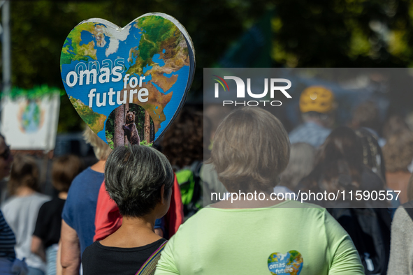 Protesters march during the global climate strike organized by Fridays for Future in Berlin, Germany, on September 20, 2024 