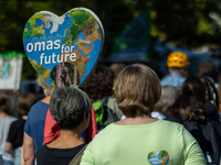 Protesters march during the global climate strike organized by Fridays for Future in Berlin, Germany, on September 20, 2024 (