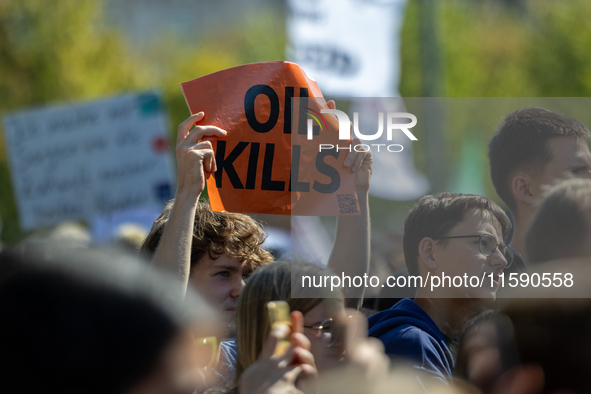 Protesters march during the global climate strike organized by Fridays for Future in Berlin, Germany, on September 20, 2024 