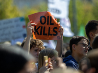 Protesters march during the global climate strike organized by Fridays for Future in Berlin, Germany, on September 20, 2024 (