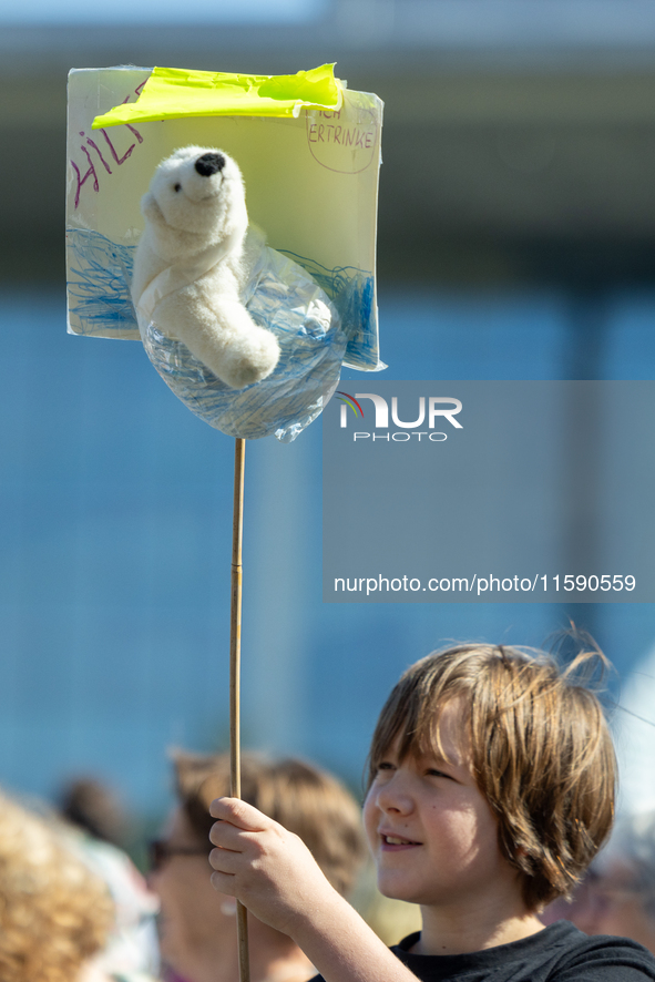 Protesters march during the global climate strike organized by Fridays for Future in Berlin, Germany, on September 20, 2024 