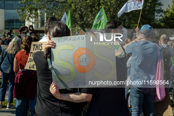 Protesters march during the global climate strike organized by Fridays for Future in Berlin, Germany, on September 20, 2024 