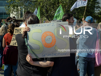 Protesters march during the global climate strike organized by Fridays for Future in Berlin, Germany, on September 20, 2024 (