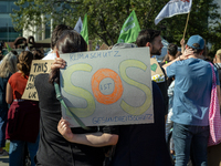 Protesters march during the global climate strike organized by Fridays for Future in Berlin, Germany, on September 20, 2024 (