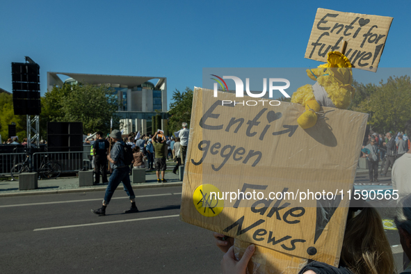 Protesters march during the global climate strike organized by Fridays for Future in Berlin, Germany, on September 20, 2024 