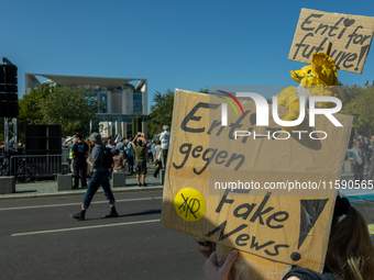 Protesters march during the global climate strike organized by Fridays for Future in Berlin, Germany, on September 20, 2024 (