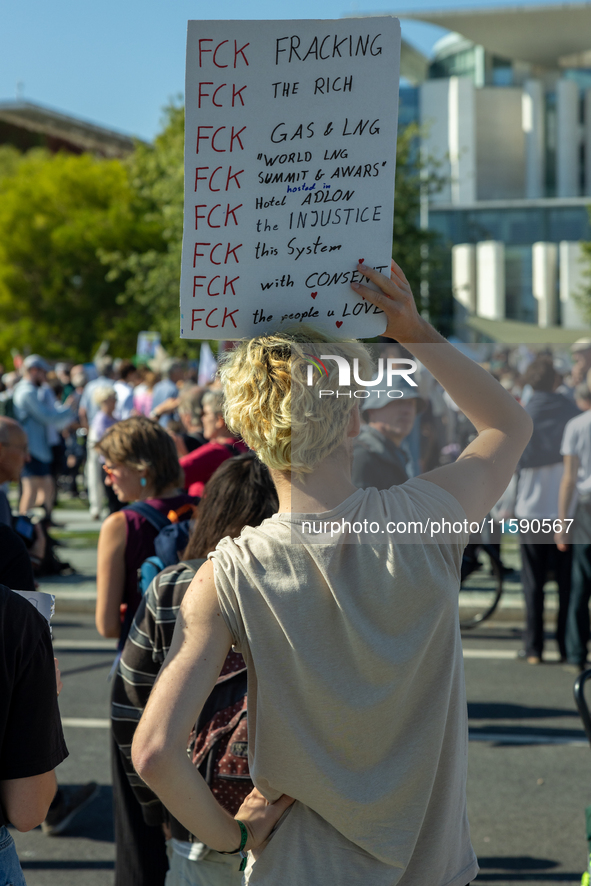 Protesters march during the global climate strike organized by Fridays for Future in Berlin, Germany, on September 20, 2024 