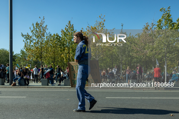 Protesters march during the global climate strike organized by Fridays for Future in Berlin, Germany, on September 20, 2024 