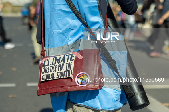 Protesters march during the global climate strike organized by Fridays for Future in Berlin, Germany, on September 20, 2024 