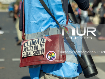 Protesters march during the global climate strike organized by Fridays for Future in Berlin, Germany, on September 20, 2024 (