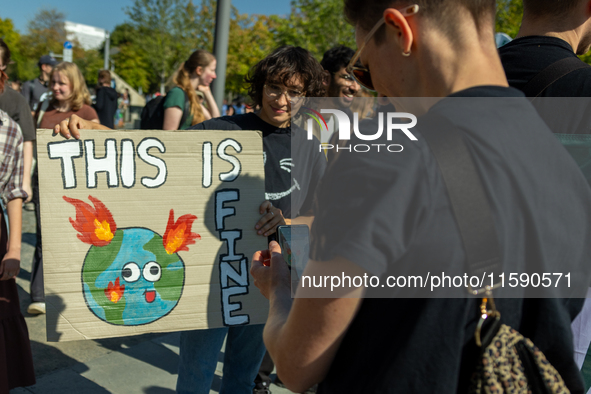 Protesters march during the global climate strike organized by Fridays for Future in Berlin, Germany, on September 20, 2024 