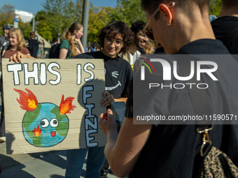 Protesters march during the global climate strike organized by Fridays for Future in Berlin, Germany, on September 20, 2024 (