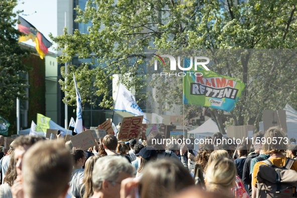 Protesters march during the global climate strike organized by Fridays for Future in Berlin, Germany, on September 20, 2024 