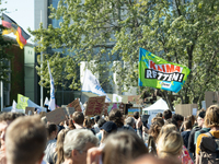 Protesters march during the global climate strike organized by Fridays for Future in Berlin, Germany, on September 20, 2024 (