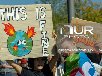 Protesters march during the global climate strike organized by Fridays for Future in Berlin, Germany, on September 20, 2024 (