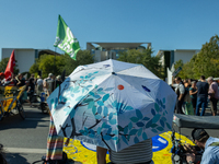 Protesters march during the global climate strike organized by Fridays for Future in Berlin, Germany, on September 20, 2024 (