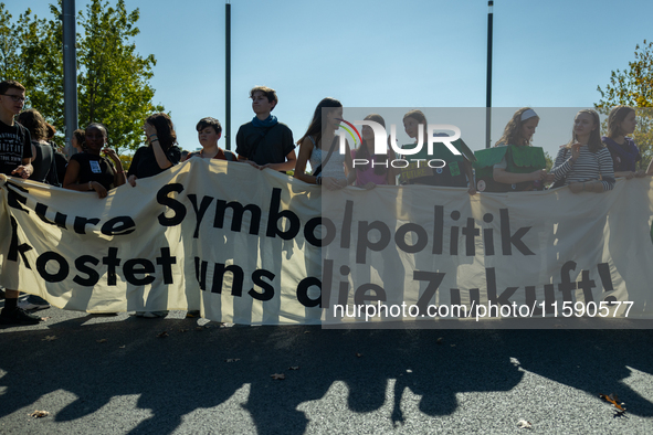 Protesters march during the global climate strike organized by Fridays for Future in Berlin, Germany, on September 20, 2024 